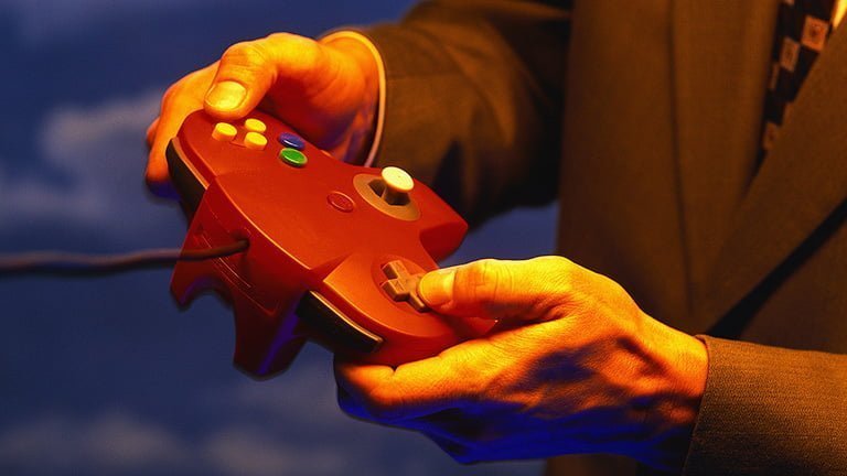 Businessman Using Video Game Controls