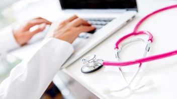 Doctor working on a laptop